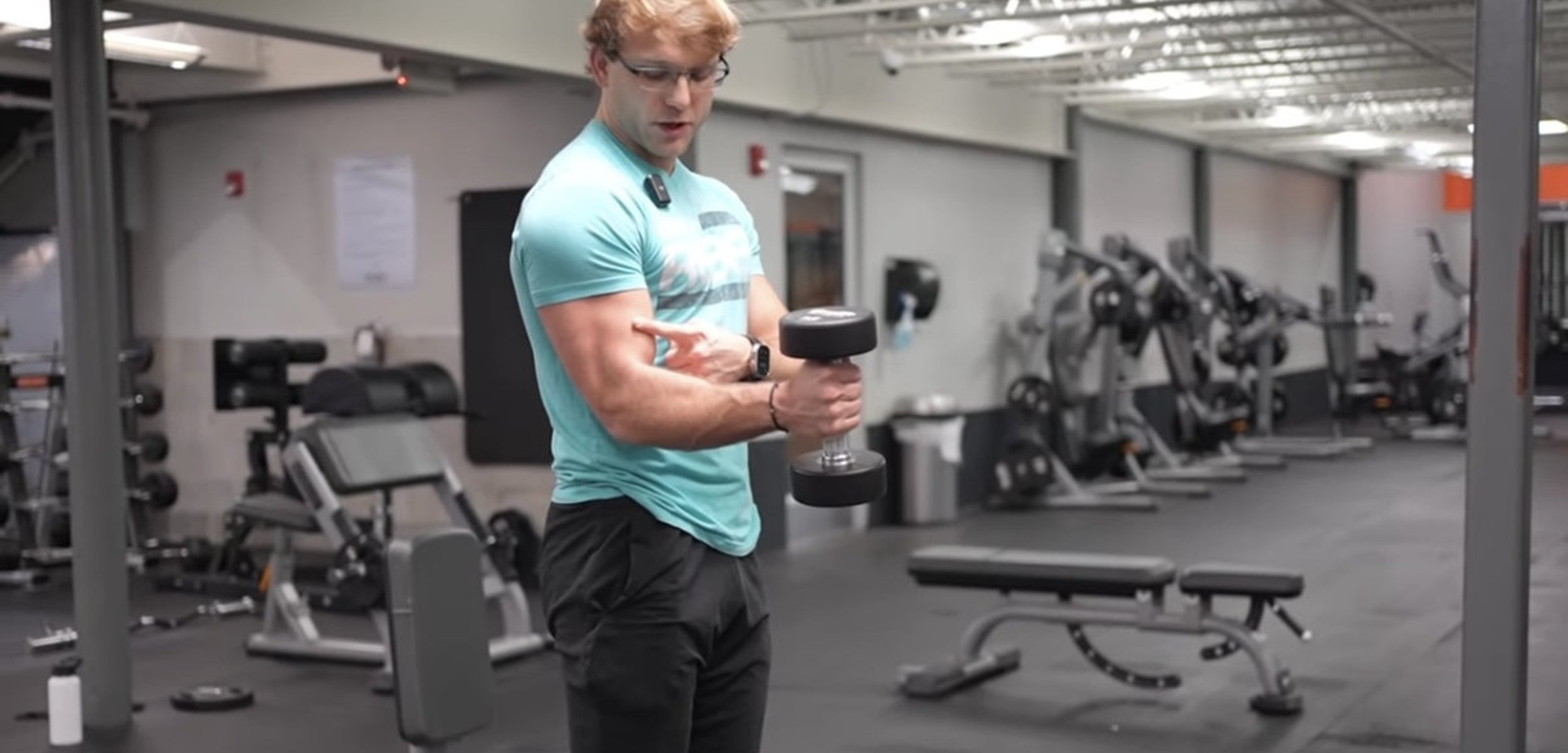 Personal trainer reviewing a weekly schedule on a tablet
