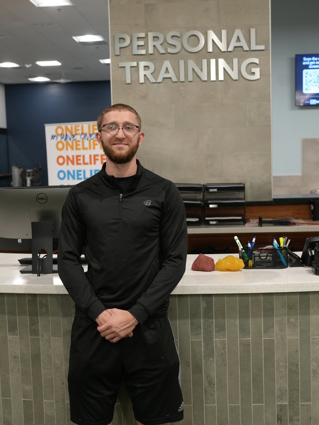 Nick Rosin at the Onelife Fitness personal training desk