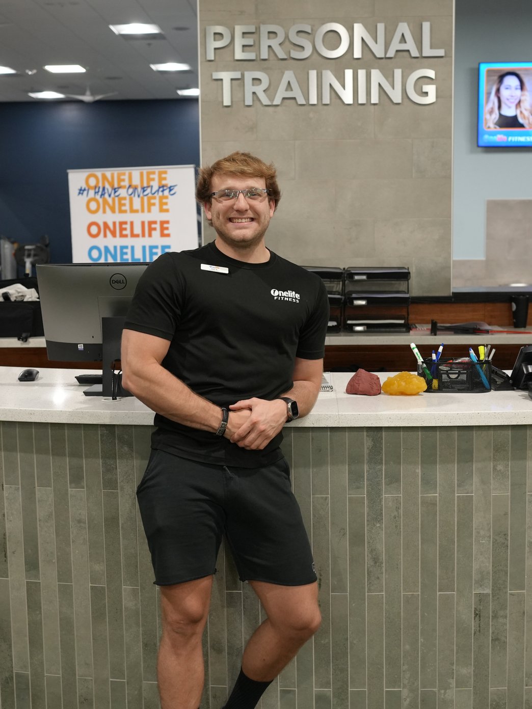 Sam Rosin at the Onelife Fitness personal training desk